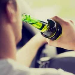 Man drinking while driving —DUI Lawyer